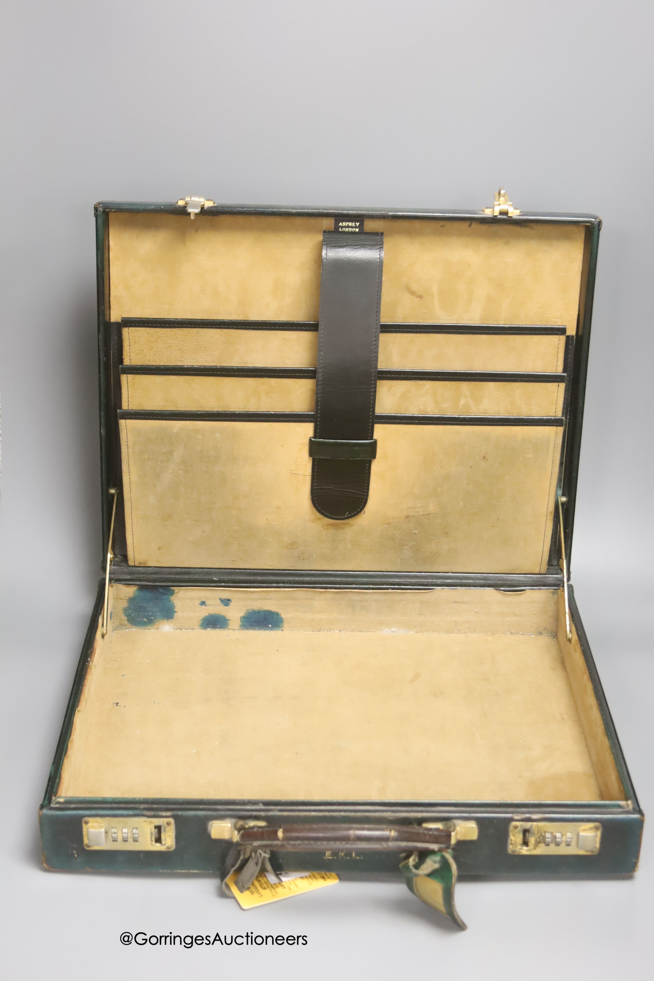 An Asprey 'James Bond' green leather briefcase, with combination lock, width 42cm